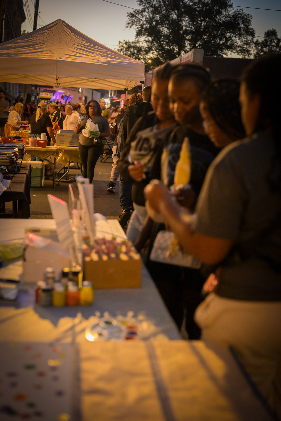 Patrons stop by The Craftorium's table during Downtown Glenside Foundation's Food Truck Festival on September 5, 2024